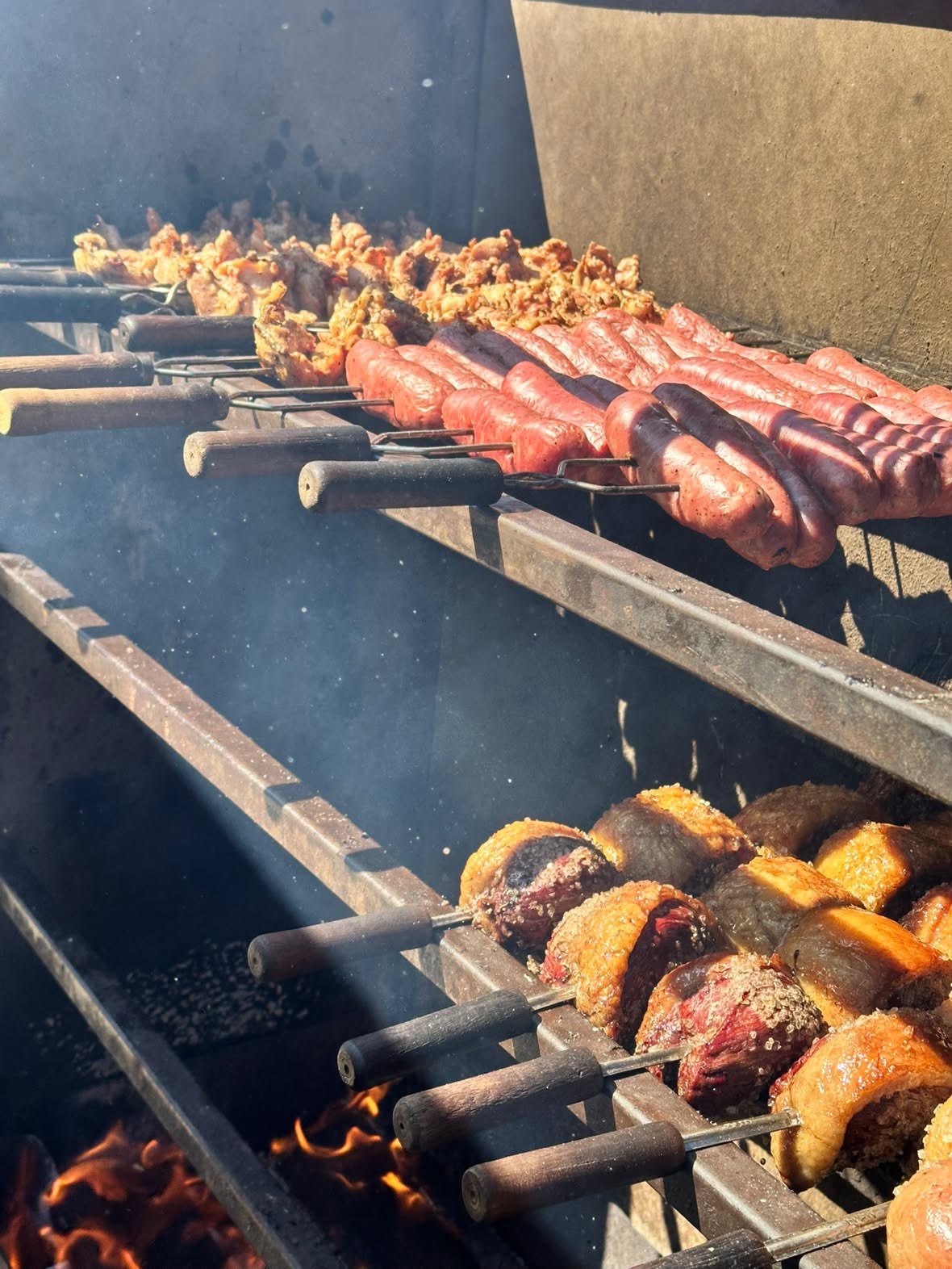 Meat skewers on Bagual charcoal grill